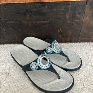 CROCS Women's Diamonte Blue and Silver Wedge Flip Flops